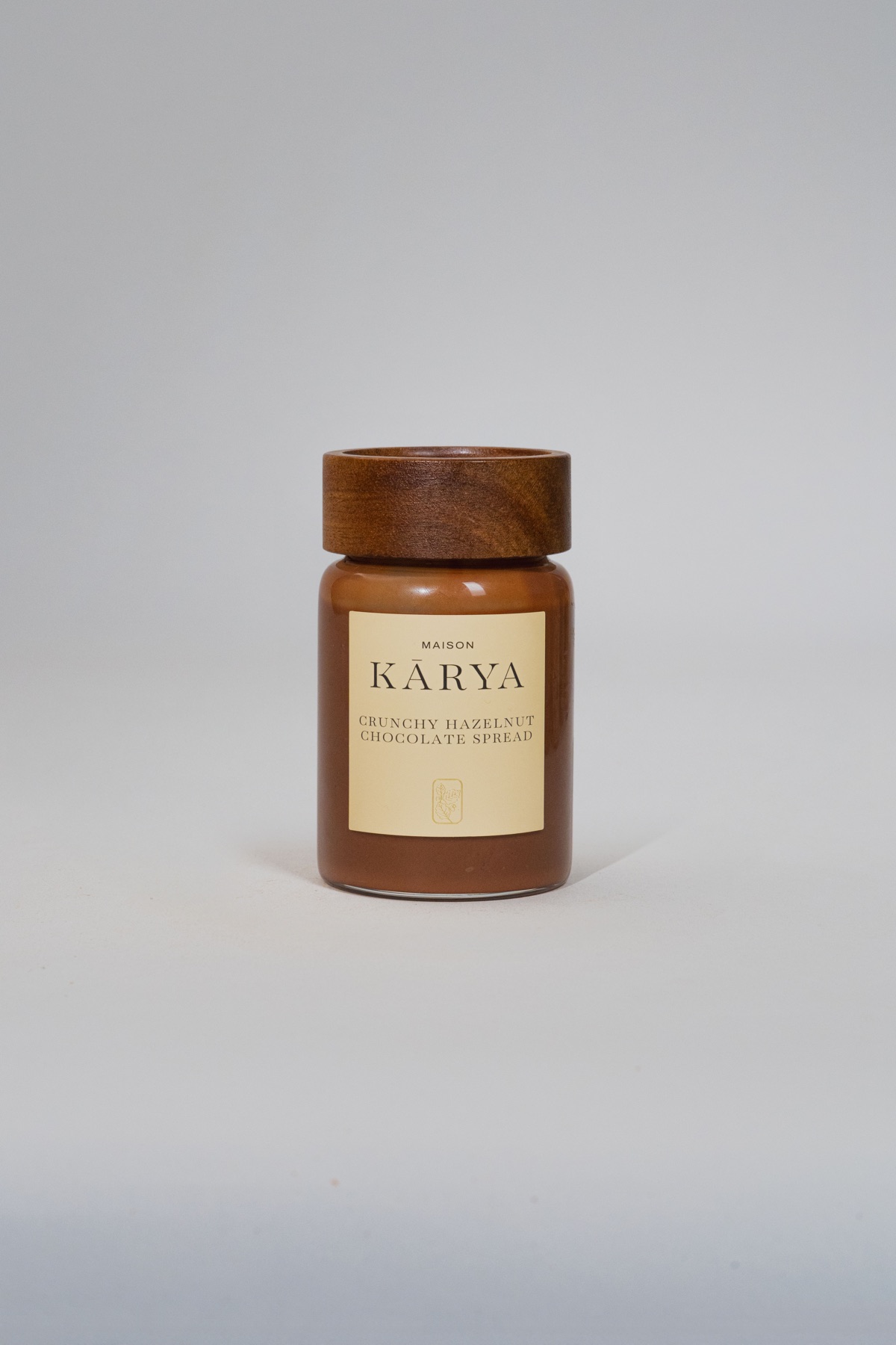Plain-screen source photograph of a chocolate spread jar
